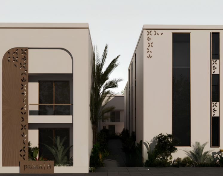كتلتان سكنيتان بمشربيات مفرّغة وممشى نخيل بينهما في مشروع بالما
